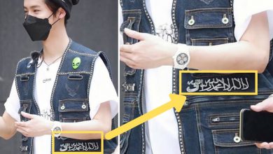 صورة معجبو الكيبوب المسلمون من كل أنحاء العالم يطالبون لوهان بالاعتذار لارتدائه شهادة التوحيد كإكسسوار على قميصه